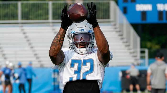 Brian Branch catches a pass during Lions training camp.